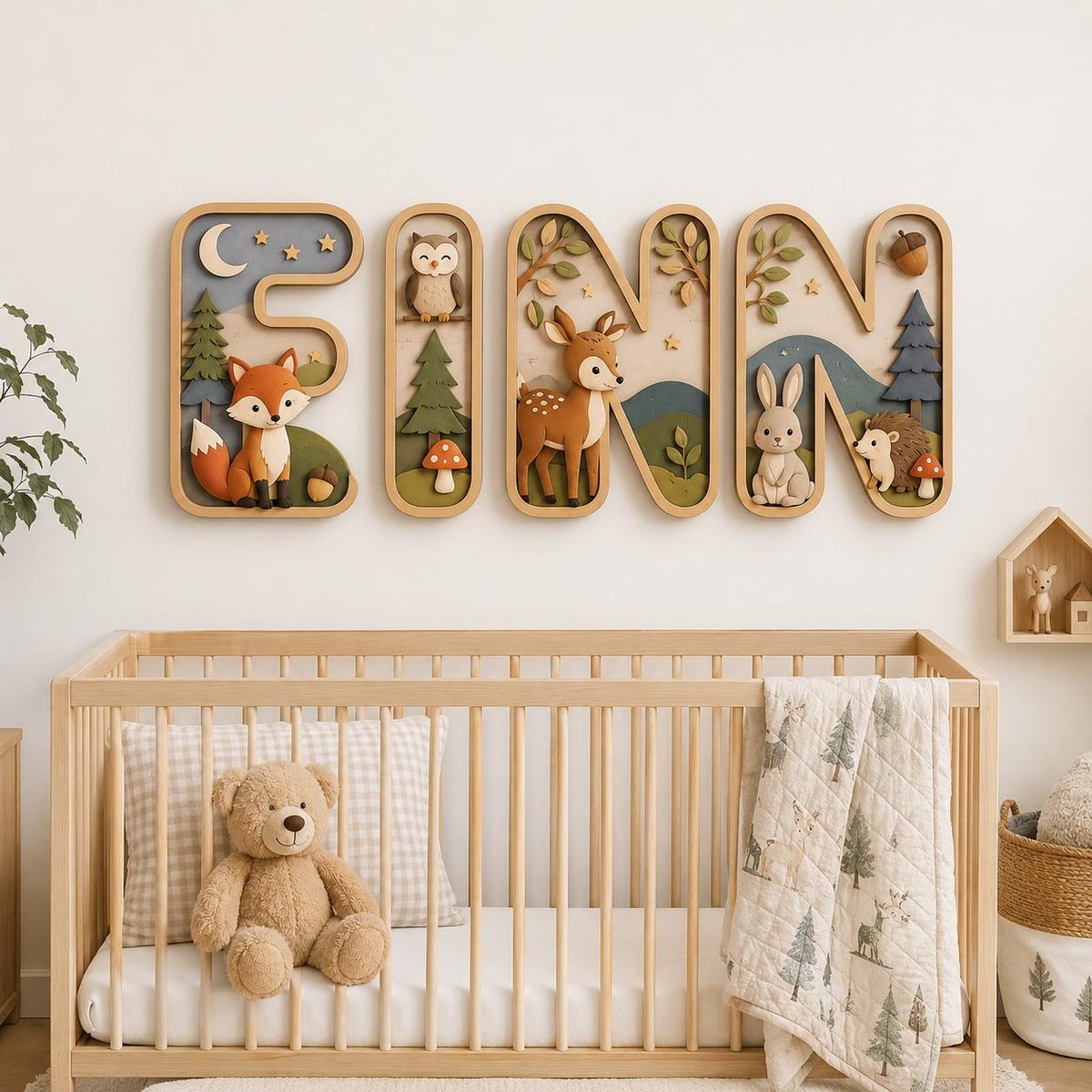 May include: A set of four wooden wall letters spelling FINN, featuring layered forest animal cutouts including a fox, owl, deer, rabbit, and hedgehog, with trees, mushrooms, and stars in muted earth tones, displayed above a wooden crib.