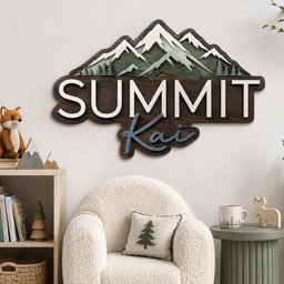May include: A layered wooden wall sign featuring a mountain range with snow-capped peaks and pine trees above the word SUMMIT in large white letters and the name Kai in a blue script font, all mounted on a dark wood-toned backing board.